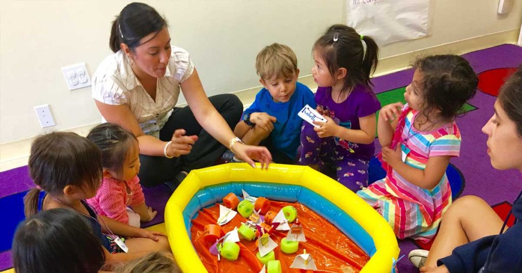 Children using Spanish during an engaging group activity.