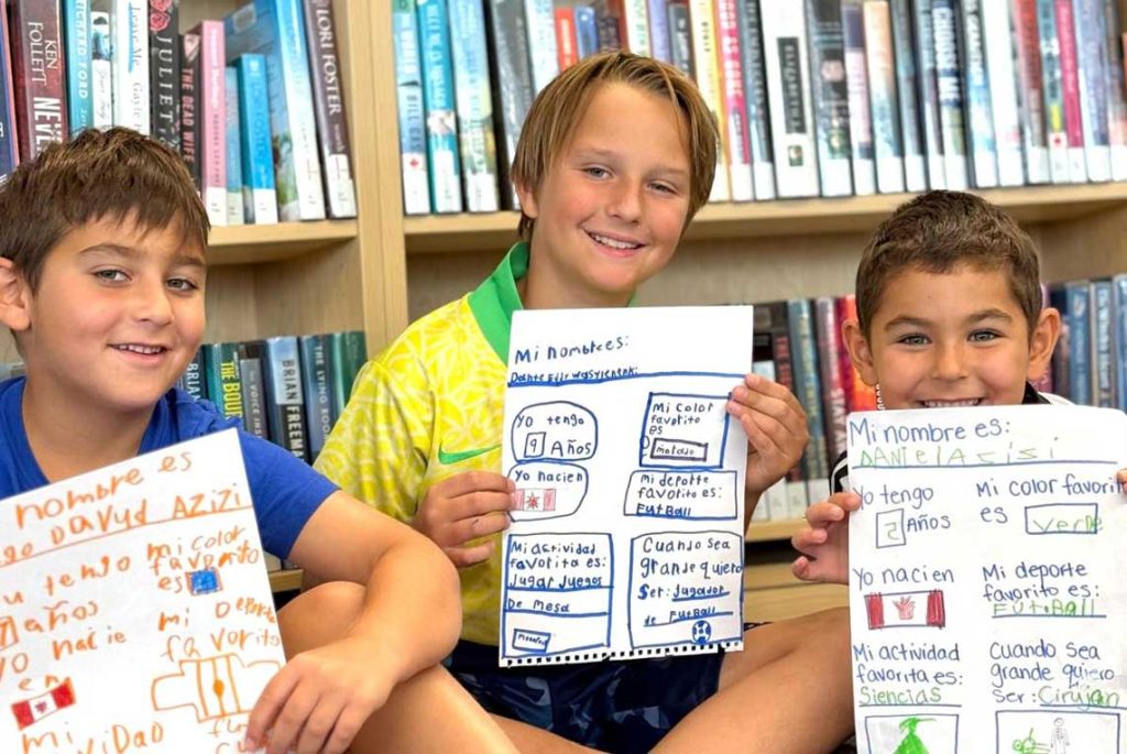 Children learning Spanish together in a group class.