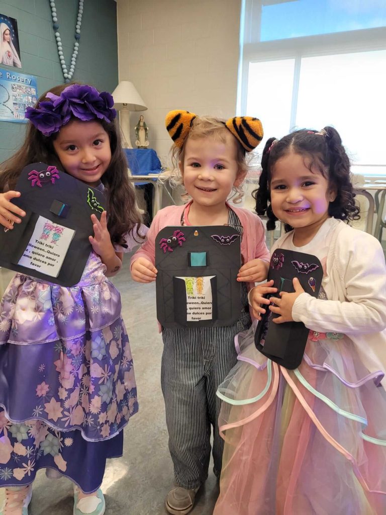 Children engaged in Spanish language learning.