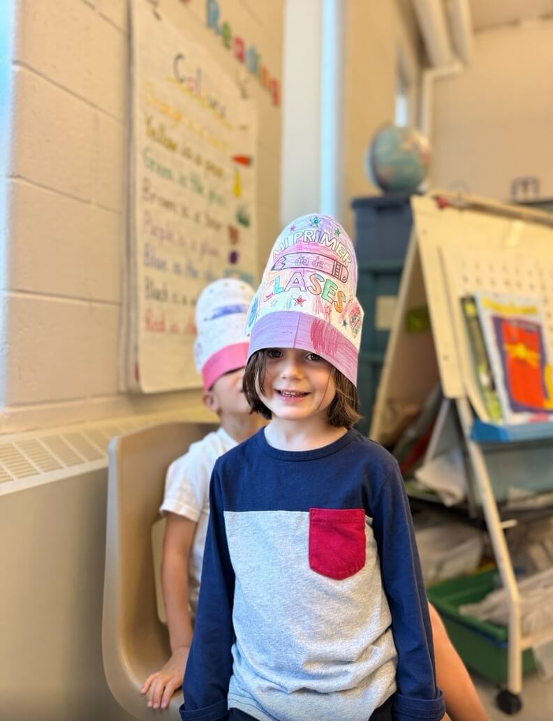 Preschool Spanish student enjoying a classroom activity