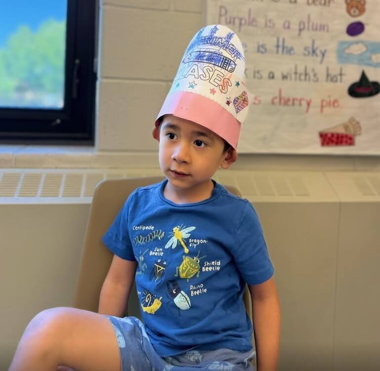 Young learner participating in a Preschool Spanish class
